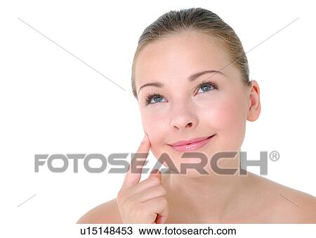 Stock Image - Close-up of a young woman smiling. Fotosearch