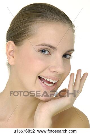 Portrait of a young woman smiling View Large Photo Image Stock Image - Portrait of a young woman smiling. Fotosearch