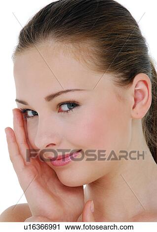 Stock Image - Portrait of a young woman smiling. Fotosearch