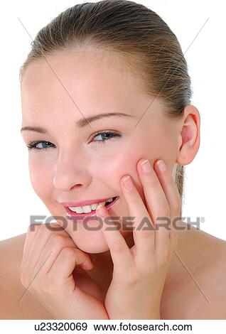 Portrait of a young woman smiling View Large Photo Image Stock Photo - Portrait of a young woman smiling. Fotosearch