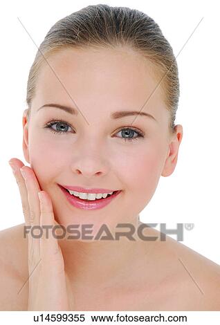 Stock Photography - Portrait of a young woman smiling. Fotosearch