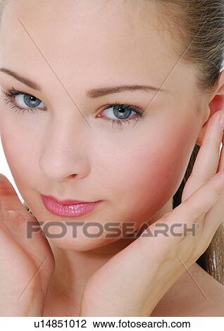 Stock Image - Portrait of a young woman. Fotosearch
