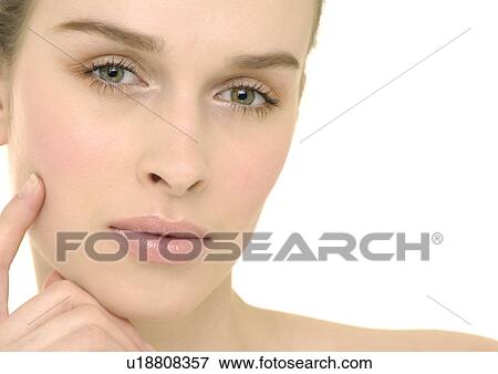 Stock Photo - Portrait of a young woman. Fotosearch