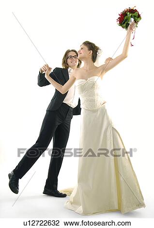 Newlywed couple dancing View Large Photo Image Stock Image - Newlywed couple dancing. Fotosearch