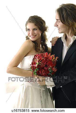 Stock Photography - Newlywed couple smiling together. Fotosearch