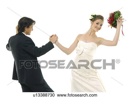 Newlywed couple dancing View Large Photo Image Stock Image - Newlywed couple dancing. Fotosearch