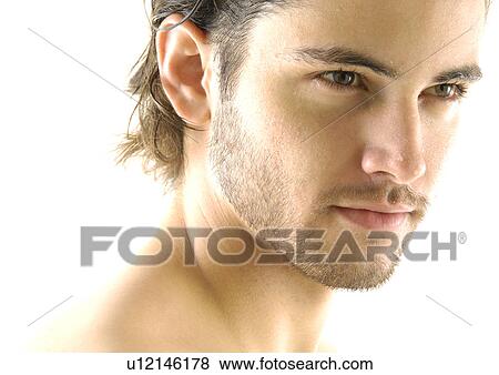Close-up of a young man View Large Photo Image Stock Photo - Close-up of a young man. Fotosearch