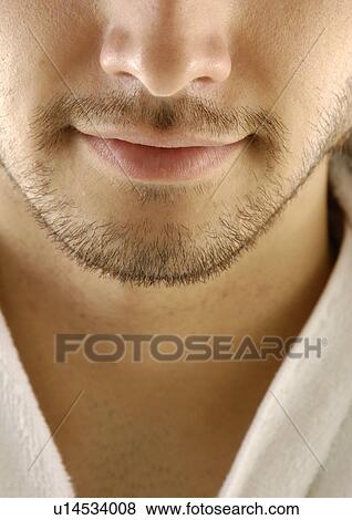 Close-up of a young man View Large Photo Image Stock Photo - Close-up of a young man. Fotosearch