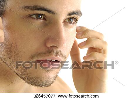 Close-up of a young man View Large Photo Image Stock Photo - Close-up of a young man. Fotosearch