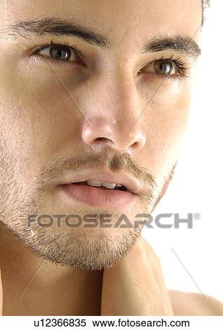 Close-up of a young man View Large Photo Image Stock Photography - Close-up of a young man. Fotosearch