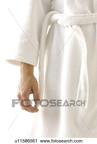 Stock Image - Mid section view of a man with a bathrobe on. Fotosearch