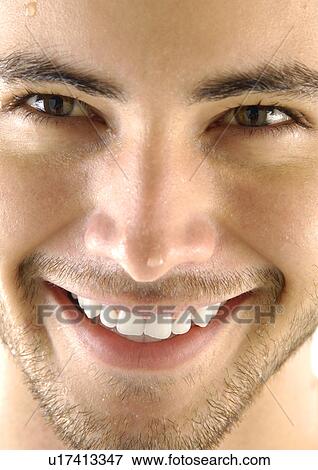Portrait of a young man smiling View Large Photo Image Stock Photo - Portrait of a young man smiling. Fotosearch