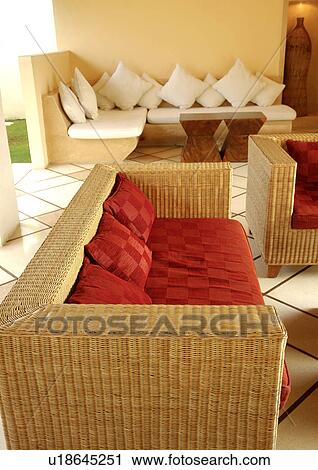 Rattan couch in a room View Large Photo Image Stock Image - Rattan couch in a room. Fotosearch