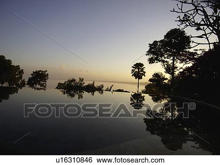 Scenic seascape from a swimming pool. View Large Photo Image Stock Photograph - Scenic seascape from a swimming pool.. Fotosearch