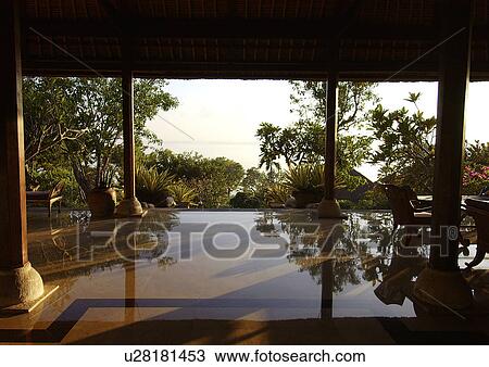 Stock Image - View of a shade with a sparkling floor.. Fotosearch