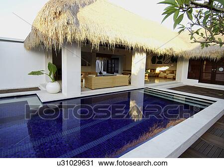 View of a swimming pool in a resort, Bvilla+Spa. View Large Photo Image Stock Image - View of a swimming pool in a resort, Bvilla+Spa.. Fotosearch