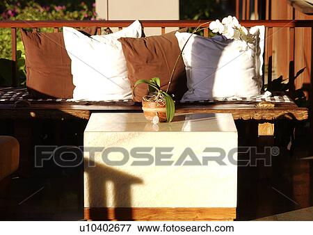 Stock Photo - View of pillows arranged on a seat in a balcony, Mayaubud.. Fotosearch