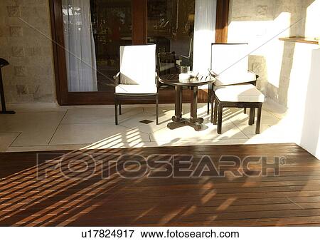 View of seating arrangement in a lanai. View Large Photo Image Stock Photo - View of seating arrangement in a lanai.. Fotosearch
