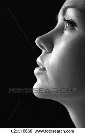 Stock Photo - Close up profile of young woman. Fotosearch