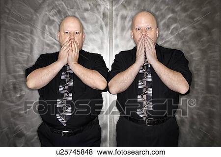 Bald mid adult identical twin men gasping with hands over mouth. View Large Photo Image Stock Photo - Bald mid adult identical twin men gasping with hands over mouth.. Fotosearch