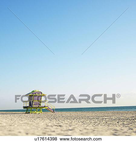 Stock Photo - Art deco lifeguard tower on deserted beach in Miami, Florida, USA.. Fotosearch