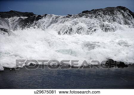 Landscape of waves crashing into rocky Hawaii coast. View Large Photo Image Stock Image - Landscape of waves crashing into rocky Hawaii coast.. Fotosearch