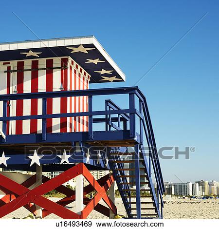 Stock Photo - Lifeguard tower painted red, white and blue with stars and stripes on beach in Miami, Florida, USA. Fotosearch