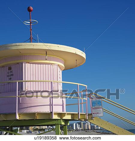 Stock Photo - Pink art deco lifeguard tower closed up on beach in Miami, Florida, USA.. Fotosearch