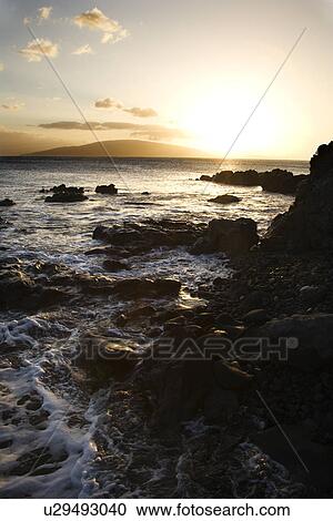 Scenic rocky coast during sunset View Large Photo Image Stock Image - Scenic rocky coast during sunset . Fotosearch