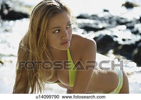 Female on beach in swimsuit View Large Photo Image Stock Image - Female on beach in swimsuit. Fotosearch