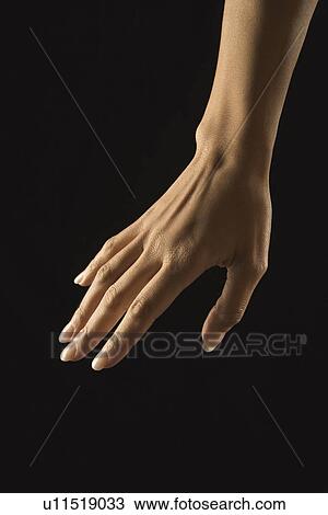 Stock Image - Woman's hand with manicure. Fotosearch