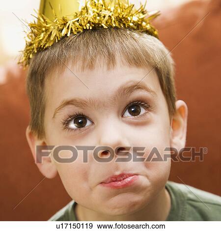 Boy wearing party hat View Large Photo Image Stock Photo - Boy wearing party hat . Fotosearch