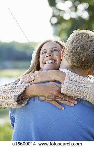 Couple hugging View Large Photo Image Picture - Couple hugging. Fotosearch