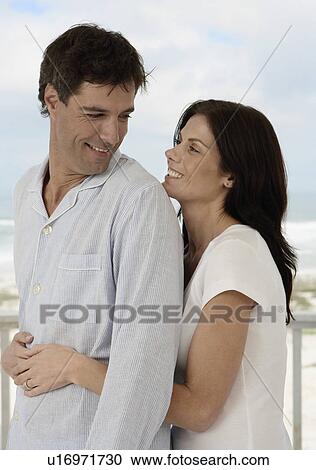 Couple hugging View Large Photo Image Stock Image - Couple hugging. Fotosearch