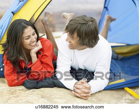 Couple lying in tent View Large Photo Image Stock Photography - Couple lying in tent. Fotosearch