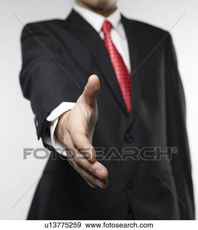 Businessman Extending Hand for Handshake View Large Photo Image Stock Photo - Businessman Extending Hand for Handshake. Fotosearch