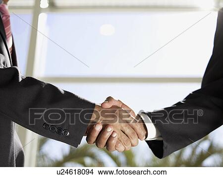 Picture - Handshake (close-up). Fotosearch