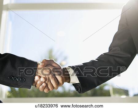 Stock Photograph - Handshake (close-up). Fotosearch