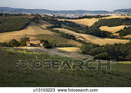 Rolling hills and building in the Tuscany, Italy countryside View Large Photo Image Stock Image - Rolling hills and building in the Tuscany, Italy countryside. Fotosearch
