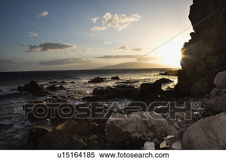 Scenic rocky coast during sunset View Large Photo Image Stock Photography - Scenic rocky coast during sunset. Fotosearch