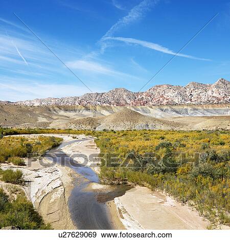 Small stream running through desert land in Cottonwood Canyon, Utah. View Large Photo Image Stock Photo - Small stream running through desert land in Cottonwood Canyon, Utah.. Fotosearch