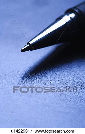 Stock Photo - Blue tone close-up of pen tip.. Fotosearch