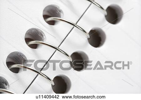 Close up of wire in spiral bound notebook View Large Photo Image Stock Image - Close up of wire in spiral bound notebook. Fotosearch