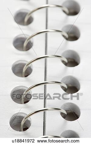 Close up of wire in spiral bound notebook. View Large Photo Image Stock Image - Close up of wire in spiral bound notebook.. Fotosearch