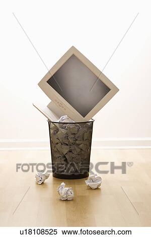Computer monitor in trash can surrounded by crumpled up paper View Large Photo Image Stock Photography - Computer monitor in trash can surrounded by crumpled up paper. Fotosearch