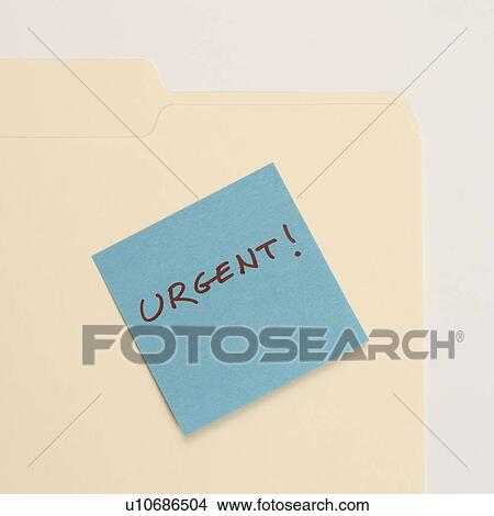 Folder with a sticky note attached reading urgent View Large Photo Image Picture - Folder with a sticky note attached reading urgent. Fotosearch