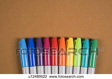 Group of colorful markers lined up in a row View Large Photo Image Stock Image - Group of colorful markers lined up in a row. Fotosearch