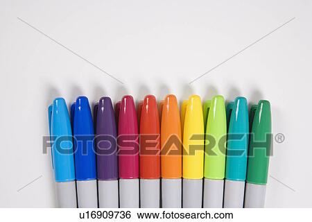 Group of colorful markers lined up in a row. View Large Photo Image Stock Photograph - Group of colorful markers lined up in a row.. Fotosearch