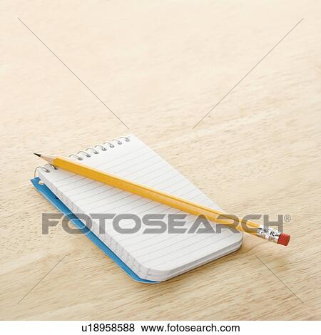 Pencil on top of open spiral bound notepad View Large Photo Image Stock Photo - Pencil on top of open spiral bound notepad. Fotosearch