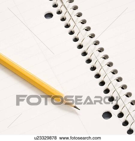 Sharp pencil placed on open spiral bound notebook View Large Photo Image Stock Photo - Sharp pencil placed on open spiral bound notebook. Fotosearch